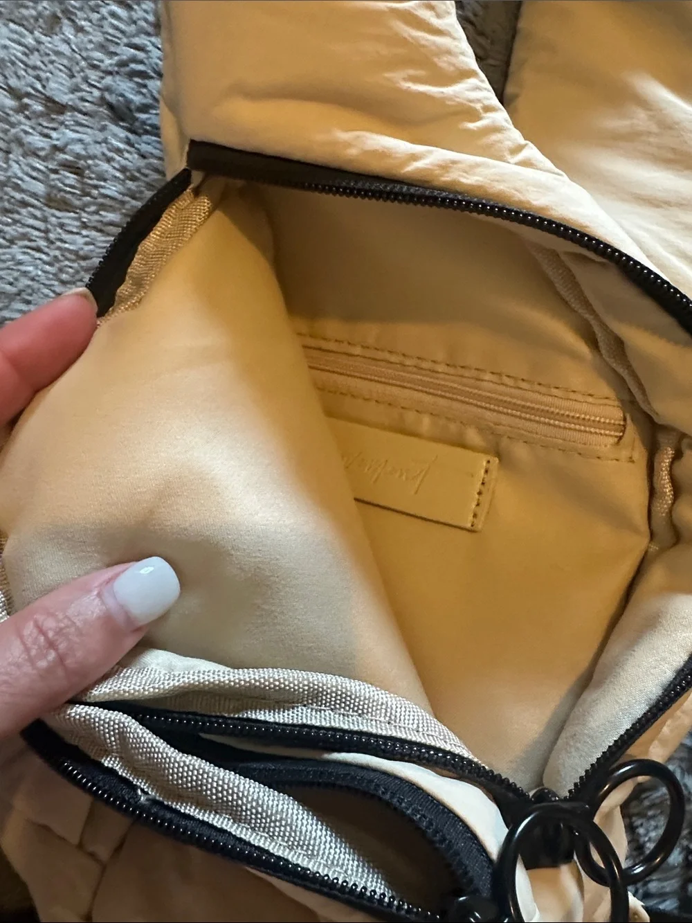 FP Movement Cream Sling Crossbody Bag with Black Accents - Picture 7 of 14